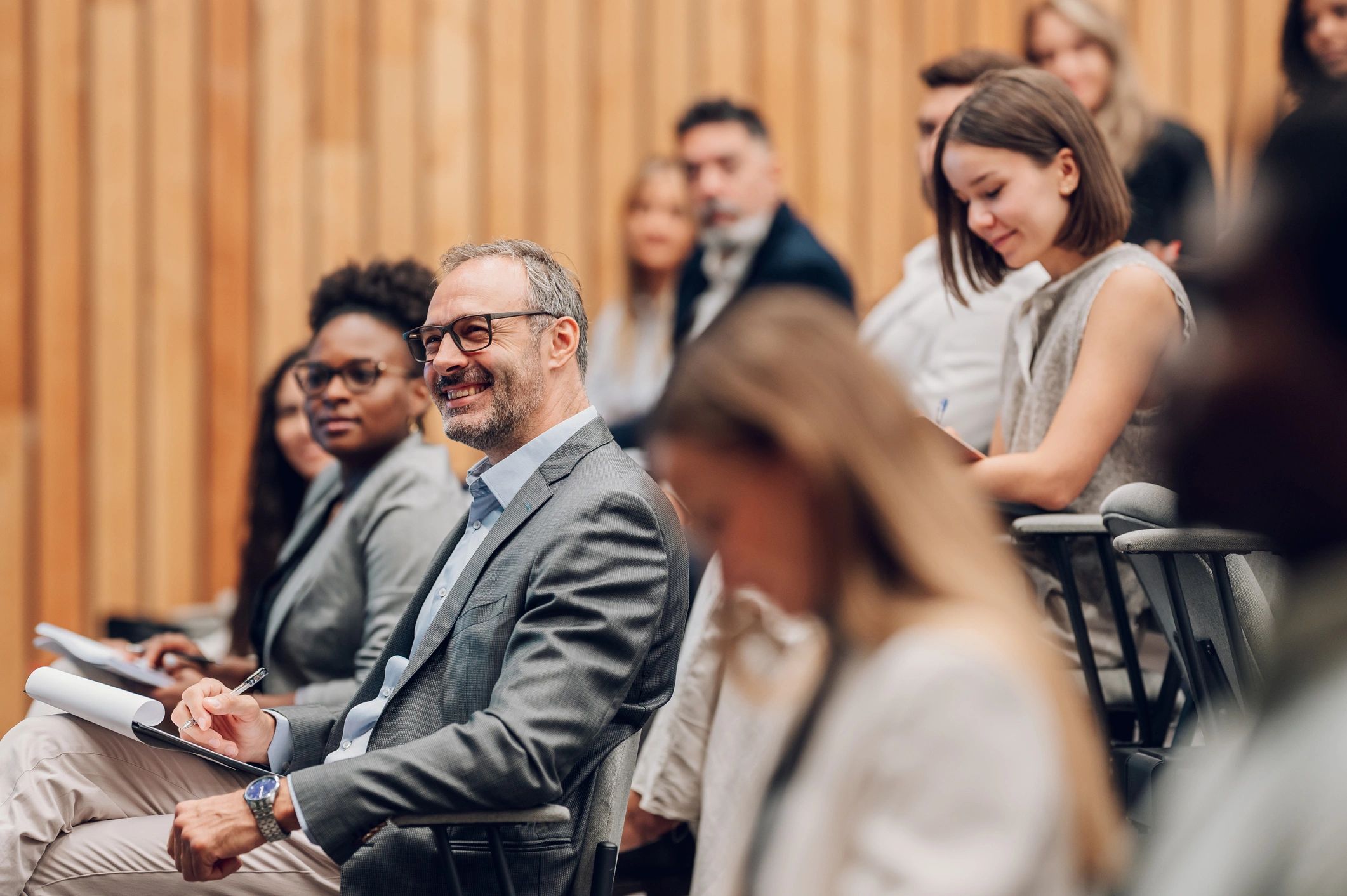 Conference attendees engaging in a workshop